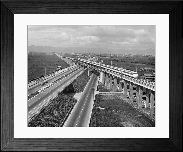 Framed Print : Japanese Supertrain Speeds Over Highway