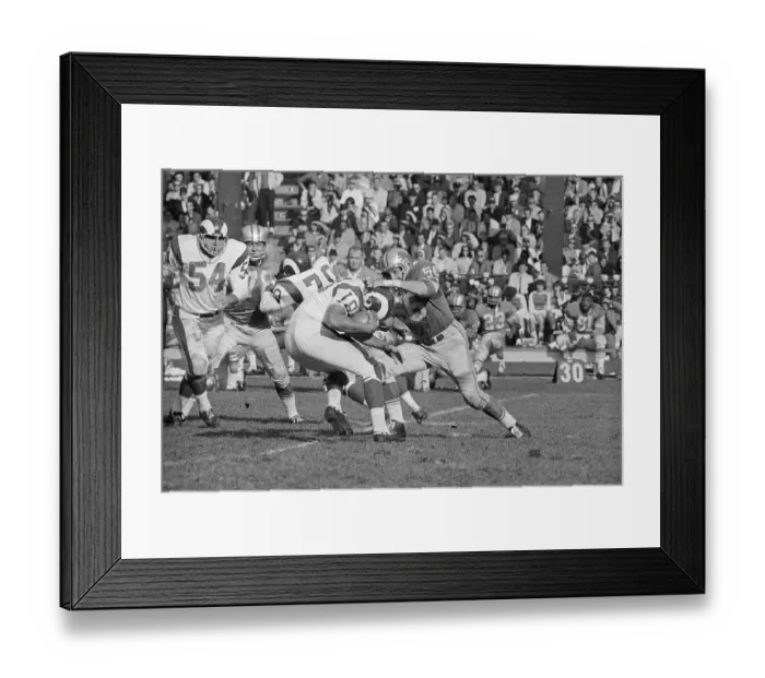 Framed Print : Football Players in Rigorous Action Framed Print : Football Players in Rigorous Action