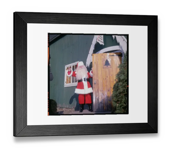Framed Print : Headmaster of Santa Claus School Waving from Doorway Framed Print : Headmaster of Santa Claus School Waving from Doorway