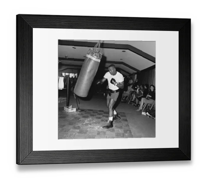 Framed Print : Sonny Liston Sending Boxing Bag Into Motion Framed Print : Sonny Liston Sending Boxing Bag Into Motion