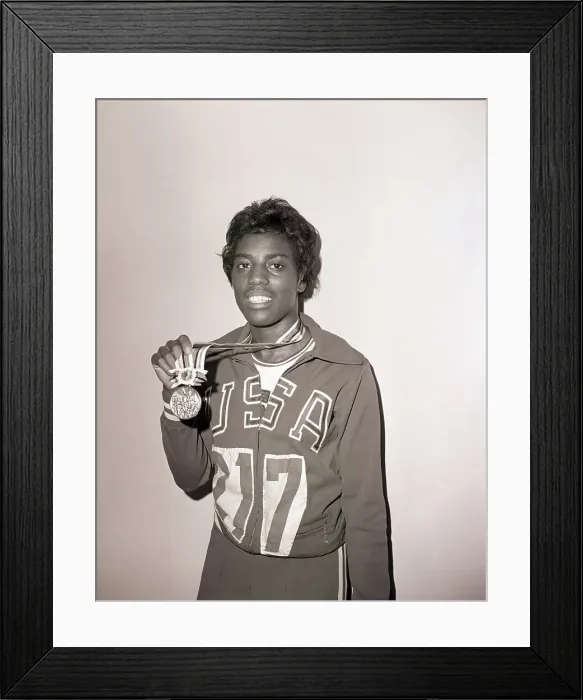 Framed Print : Wyomia Tyus Poses with Olympic Gold Medal Framed Print : Wyomia Tyus Poses with Olympic Gold Medal