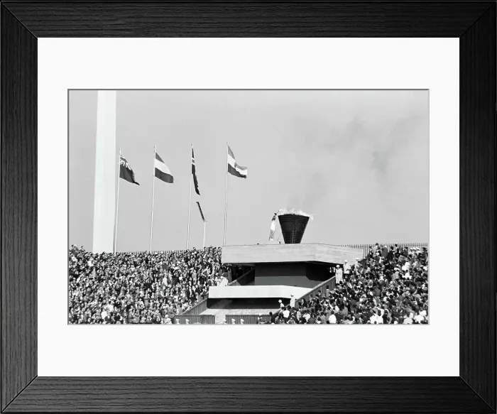Framed Print : Man Lighting Olympic Flame Framed Print : Man Lighting Olympic Flame