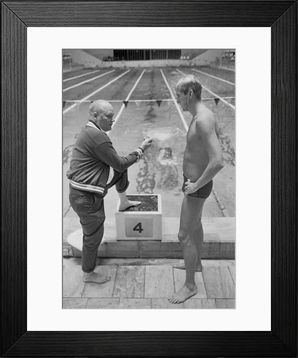Framed Print : Coach Discussing Timing with Jed Graef