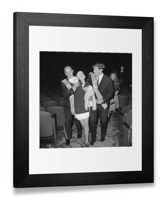 Framed Print : Security Escorting Exhausted Beatle Fan Framed Print : Security Escorting Exhausted Beatle Fan
