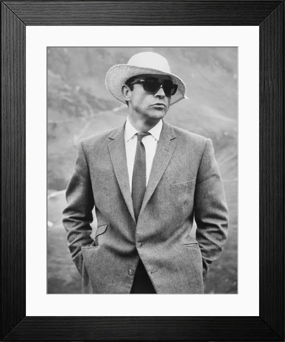 Framed Print : Sean Connery Wears Straw Hat and Sunglasses Framed Print : Sean Connery Wears Straw Hat and Sunglasses