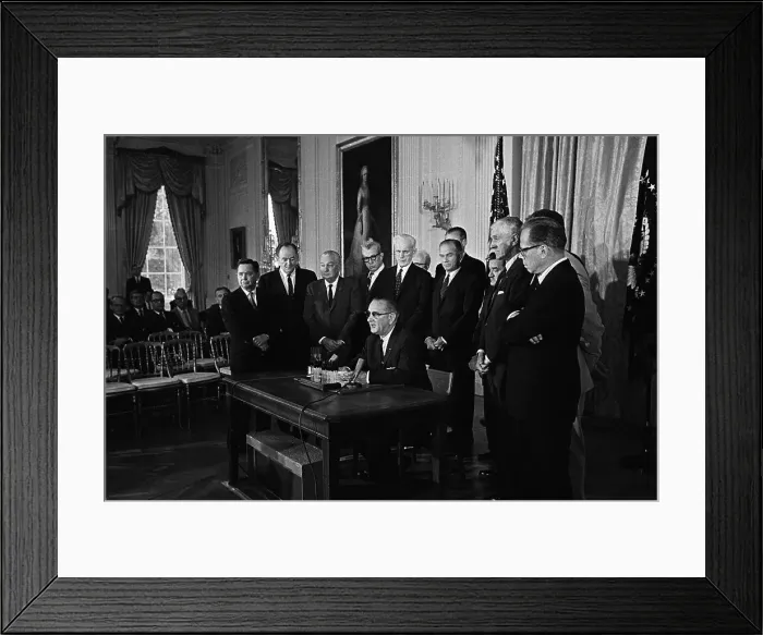 Framed Print : Lyndon Johnson Signing Law in Front of Senators Framed Print : Lyndon Johnson Signing Law in Front of Senators