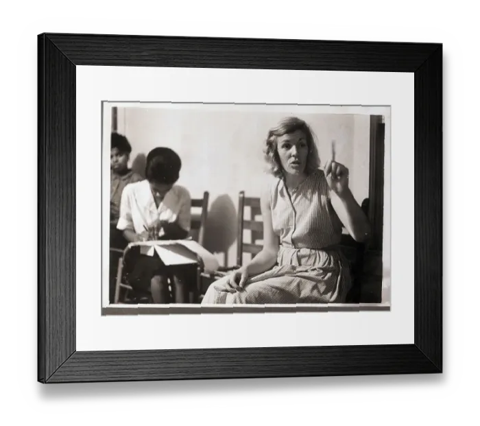 Framed Print : Woman Speaking with Finger Raised Framed Print : Woman Speaking with Finger Raised