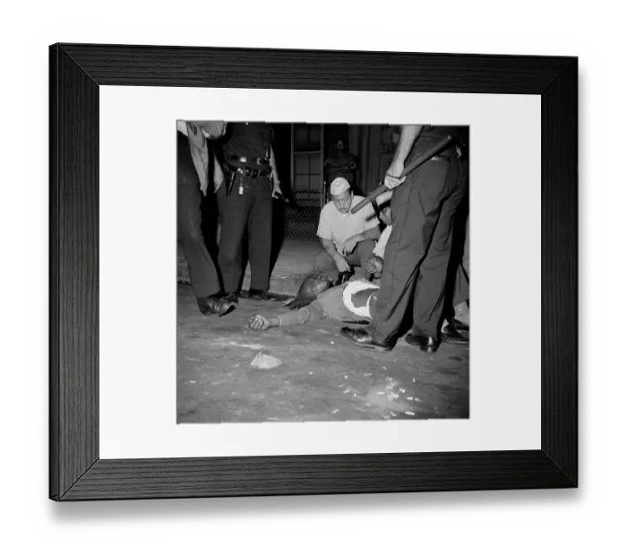 Framed Print : Suspected Looter Shot & Lying On Ground Framed Print : Suspected Looter Shot & Lying On Ground