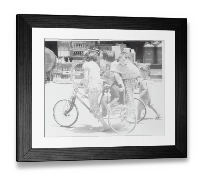 Framed Print : People Crowding on Tricycle Framed Print : People Crowding on Tricycle