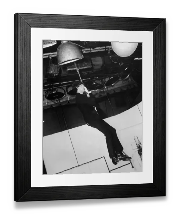 Framed Print : Paul McCartney Dangling from Rope Framed Print : Paul McCartney Dangling from Rope