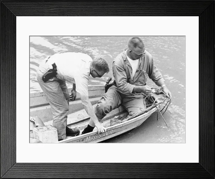 Framed Print : Government Agents Dropping Hooks