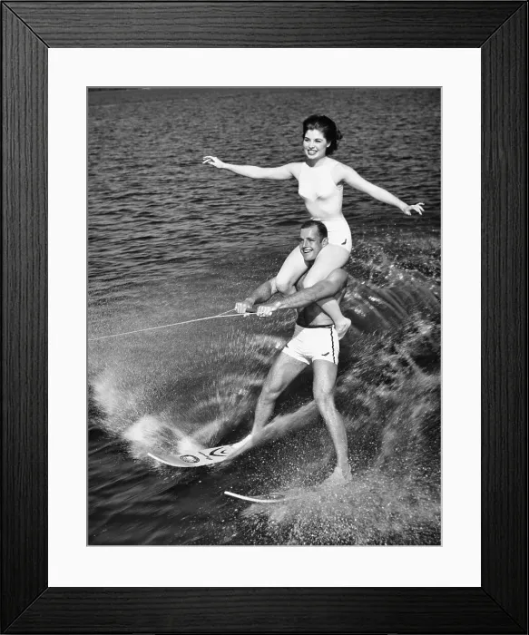 Framed Print : Couple Performing Water Skiing Act Framed Print : Couple Performing Water Skiing Act