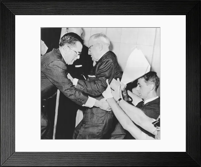 Framed Print : Truman falling and being helped by two men Framed Print : Truman falling and being helped by two men