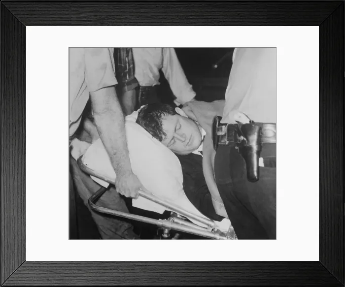 Framed Print : Edward Kennedy Laying on a Stretcher Framed Print : Edward Kennedy Laying on a Stretcher