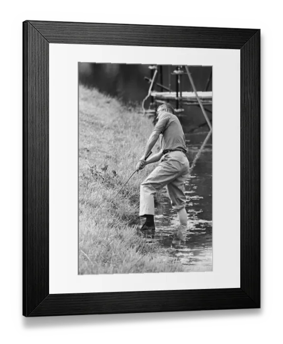Framed Print : Golfer Billy Patton Chipping from Water Framed Print : Golfer Billy Patton Chipping from Water