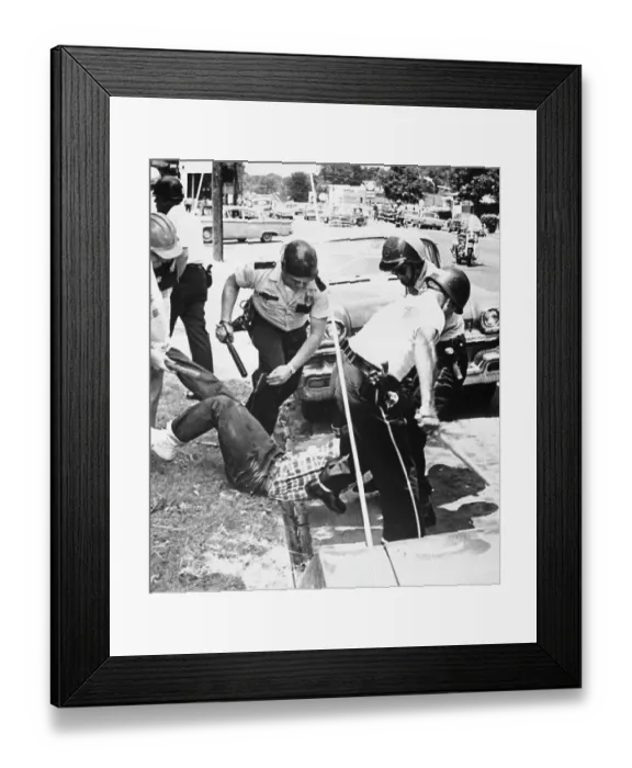 Framed Print : Police Restrain Demonstrator Framed Print : Police Restrain Demonstrator