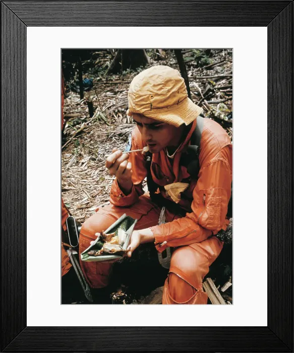 Framed Print : Roger Chaffee Eating in Jungle Framed Print : Roger Chaffee Eating in Jungle