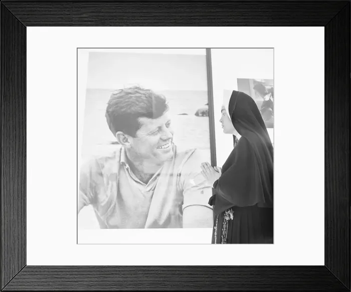 Framed Print : Nun Praying Beside Photo of John F. Kennedy Framed Print : Nun Praying Beside Photo of John F. Kennedy