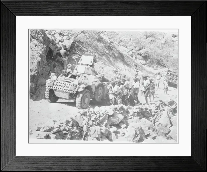 Framed Print : Villagers Helping British Troops Push Armored Car Framed Print : Villagers Helping British Troops Push Armored Car