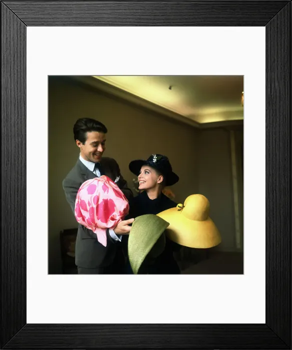 Framed Print : Virna Lisi Trying on Hats Framed Print : Virna Lisi Trying on Hats