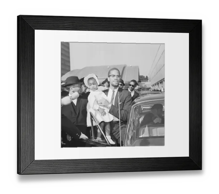 Framed Print : Malcolm X with Daughter Ilyasah Framed Print : Malcolm X with Daughter Ilyasah