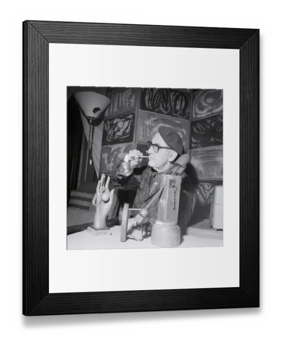 Framed Print : Man Ray Surrounded by Sculptures and Paintings Framed Print : Man Ray Surrounded by Sculptures and Paintings
