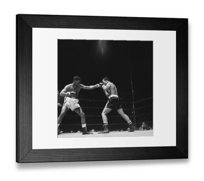 Framed Print : Wilbert Mcclure Punches Jose Torres Framed Print : Wilbert Mcclure Punches Jose Torres