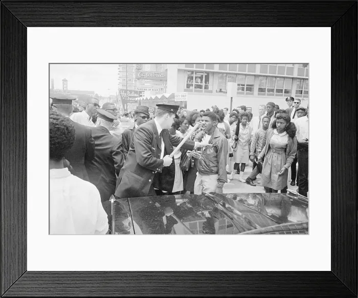 Framed Print : Policeman Threatening Demonstrator with Nightstick Framed Print : Policeman Threatening Demonstrator with Nightstick