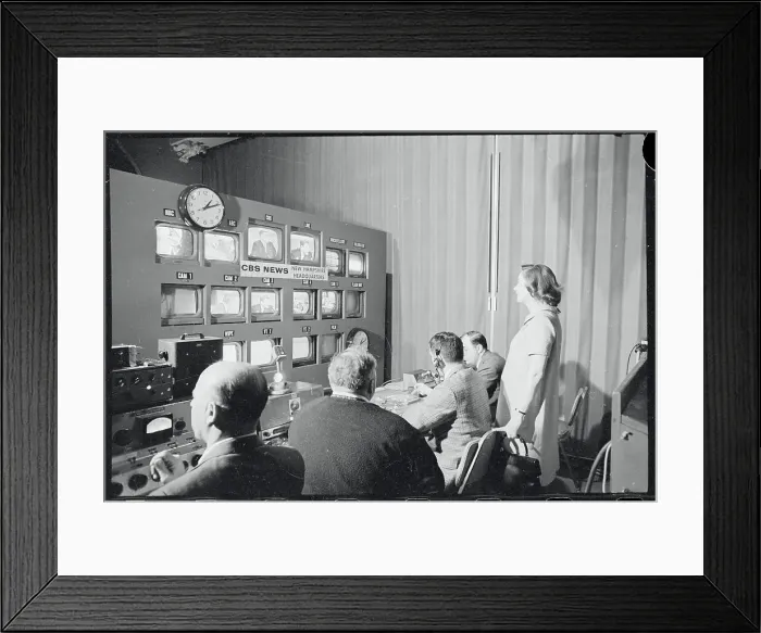 Framed Print : Mrs. Nelson Rockefeller Observing Husband on Television