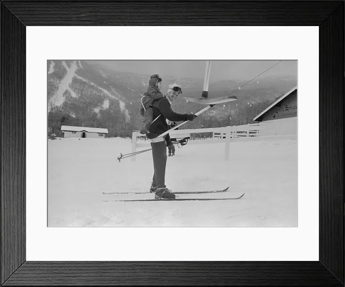Framed Print : Ted Kennedy on Skis with Young John Jr. Strapped to His back Framed Print : Ted Kennedy on Skis with Young John Jr. Strapped to His back