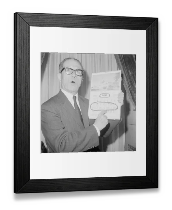 Framed Print : Louisiana Senator Allen J. Ellender Holding a Calendar Framed Print : Louisiana Senator Allen J. Ellender Holding a Calendar