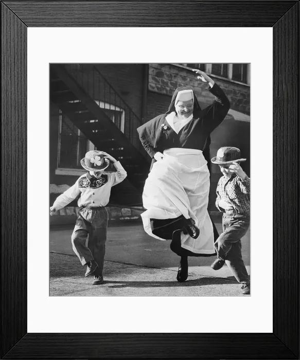 Framed Print : Nun Dancing with Children Framed Print : Nun Dancing with Children