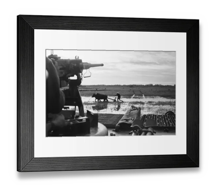 Framed Print : Farmer Working Under the Gun Framed Print : Farmer Working Under the Gun