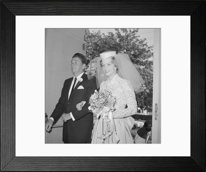 Framed Print : Ronald Reagan Escorting His Daughter Framed Print : Ronald Reagan Escorting His Daughter