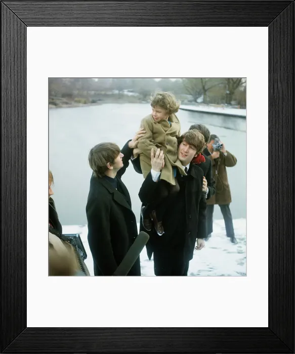 Framed Print : John Lennon Carrying a Girl Framed Print : John Lennon Carrying a Girl