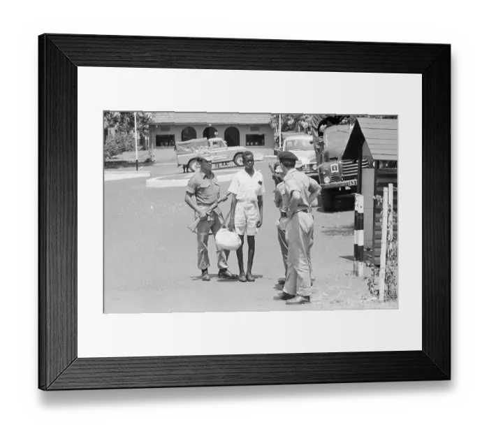 Framed Print : British Soldiers Keep Ugandan at Gunpoint Framed Print : British Soldiers Keep Ugandan at Gunpoint