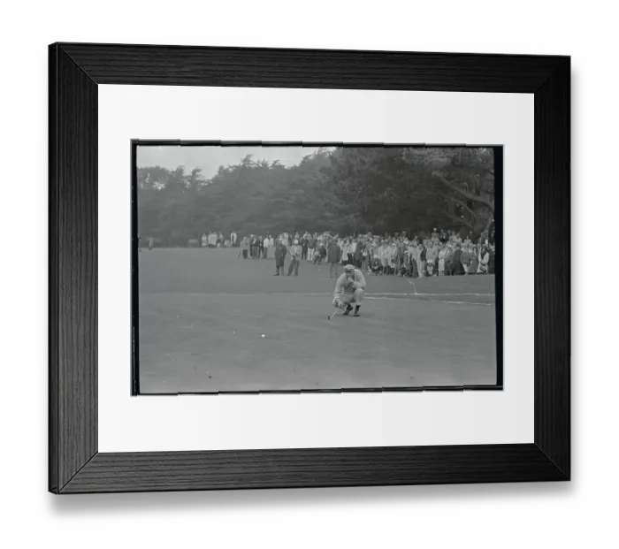 Framed Print : Arnold Palmer Bending Down on Golf Course Framed Print : Arnold Palmer Bending Down on Golf Course