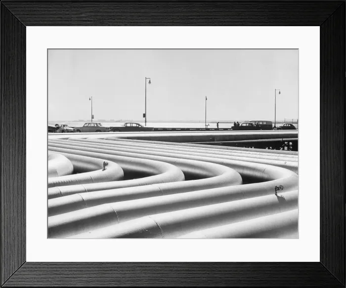 Framed Print : Curving Oil Pipelines