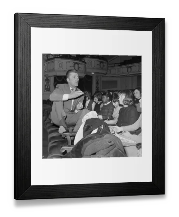 Framed Print : Kirk Douglas Sits on Desk Talks to Students Framed Print : Kirk Douglas Sits on Desk Talks to Students