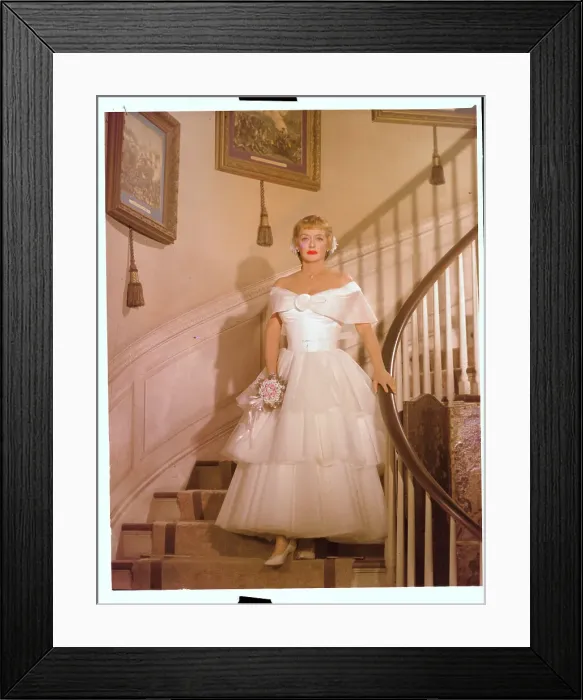 Framed Print : Actress Bette Davis in Formal Dress and Standing on Stairs Framed Print : Actress Bette Davis in Formal Dress and Standing on Stairs