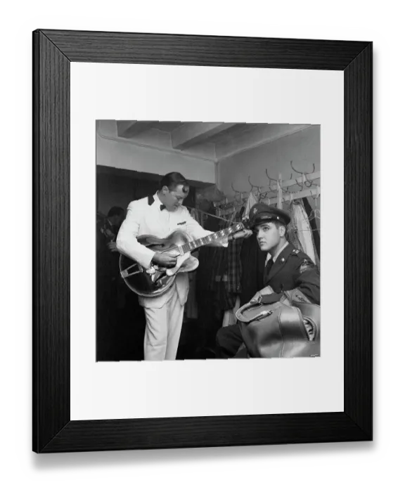 Framed Print : Elvis Presley Listens to Bill Haley Tune Guitar