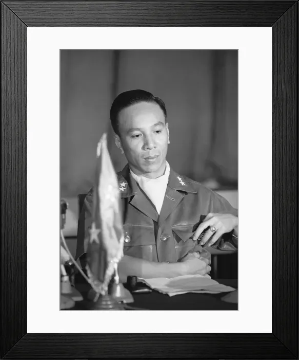 Framed Print : Nguyen Van Thieu Sitting and Reaching into His Pocket
