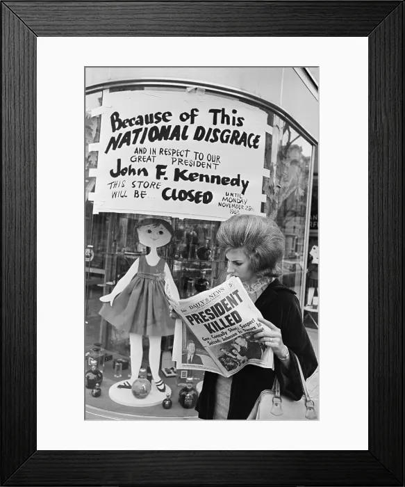 Framed Print : Woman Reading About President Kennedy's Assassination Framed Print : Woman Reading About President Kennedy's Assassination