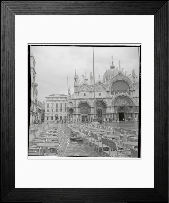 Framed Print : Young Child Paddling Boat Through Venice Framed Print : Young Child Paddling Boat Through Venice