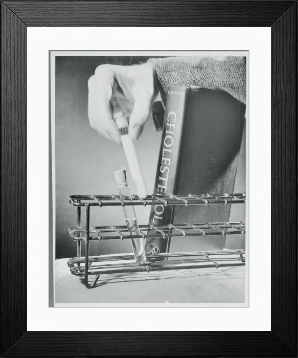 Framed Print : Hand Holding Test Tube Framed Print : Hand Holding Test Tube