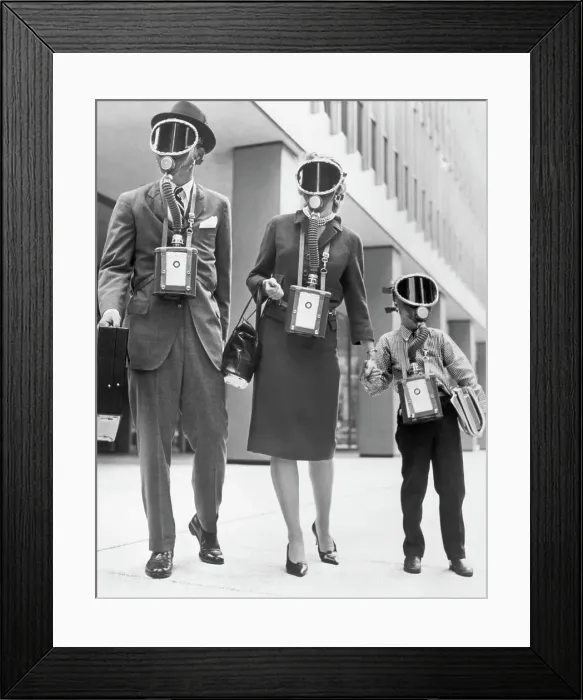 Framed Print : Family Displaying Gas Masks Framed Print : Family Displaying Gas Masks