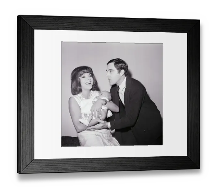 Framed Print : Joan Collins and Anthony Newly with Baby Framed Print : Joan Collins and Anthony Newly with Baby