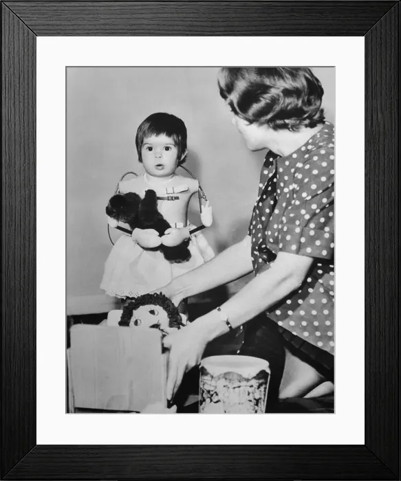 Framed Print : Young Toddler with Artificial Arms