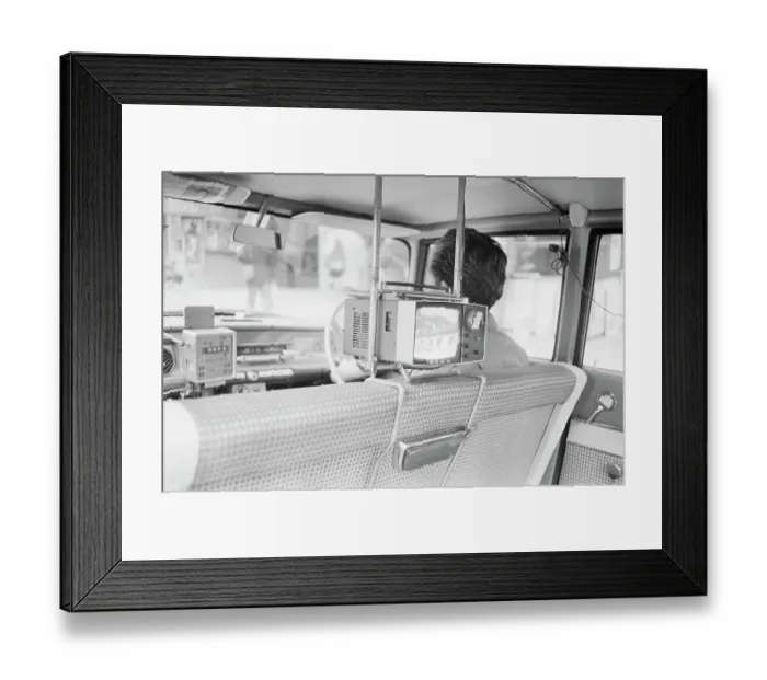 Framed Print : Japanese Taxi Customers Watch Television Framed Print : Japanese Taxi Customers Watch Television