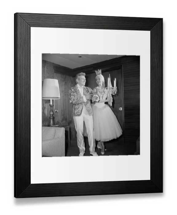 Framed Print : Liberace Showing off Jacket to Showgirl Framed Print : Liberace Showing off Jacket to Showgirl